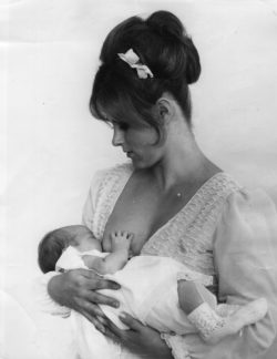 circa 1970: A mother breast-feeds her child. (Photo by Hulton Archive/Getty Images)